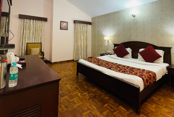 A side view of a plate of figs and berries.