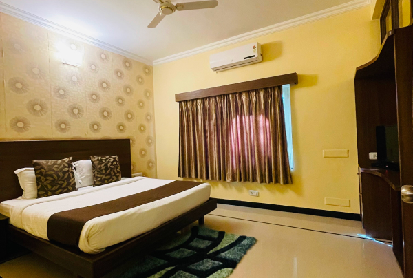 A side view of a plate of figs and berries.